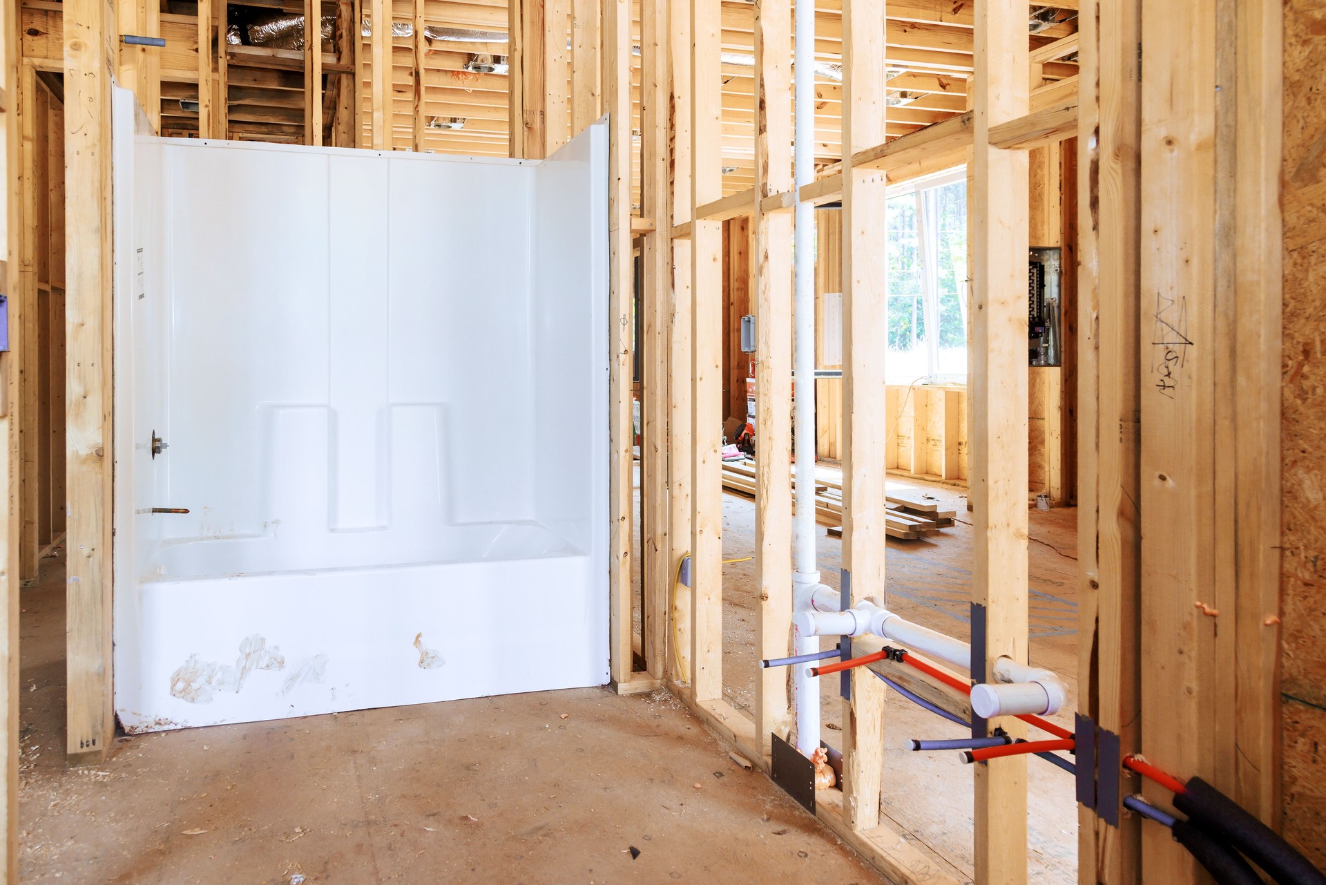 Plumbing work bathroom remodel installing new acrylic bathtub in a new house